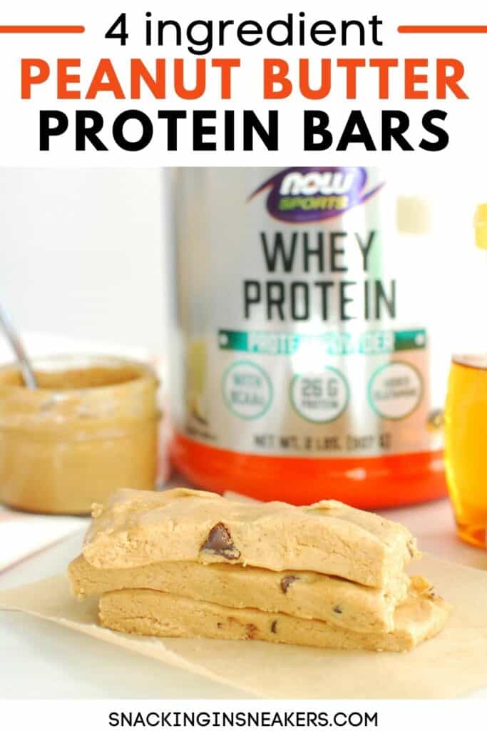 Several homemade peanut butter protein bars stacked on top of each other.