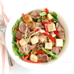 Overhead shot of a bowl of cheesesteak salad.