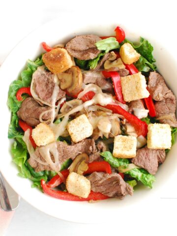 Overhead shot of a bowl of cheesesteak salad.