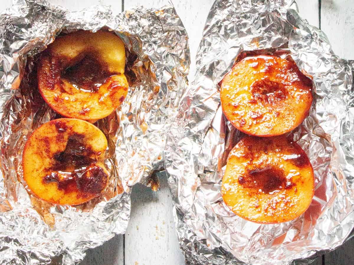 Caramelized peaches in aluminum foil.