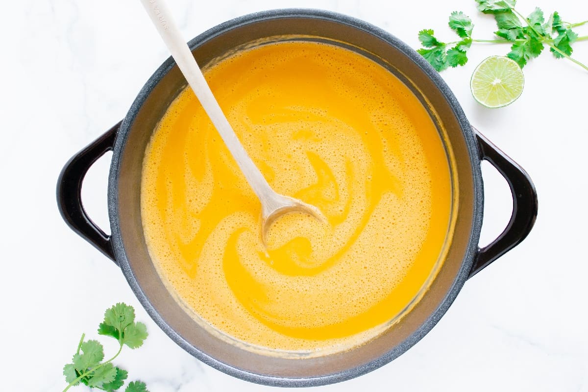 Creamy butternut squash soup in a pot.