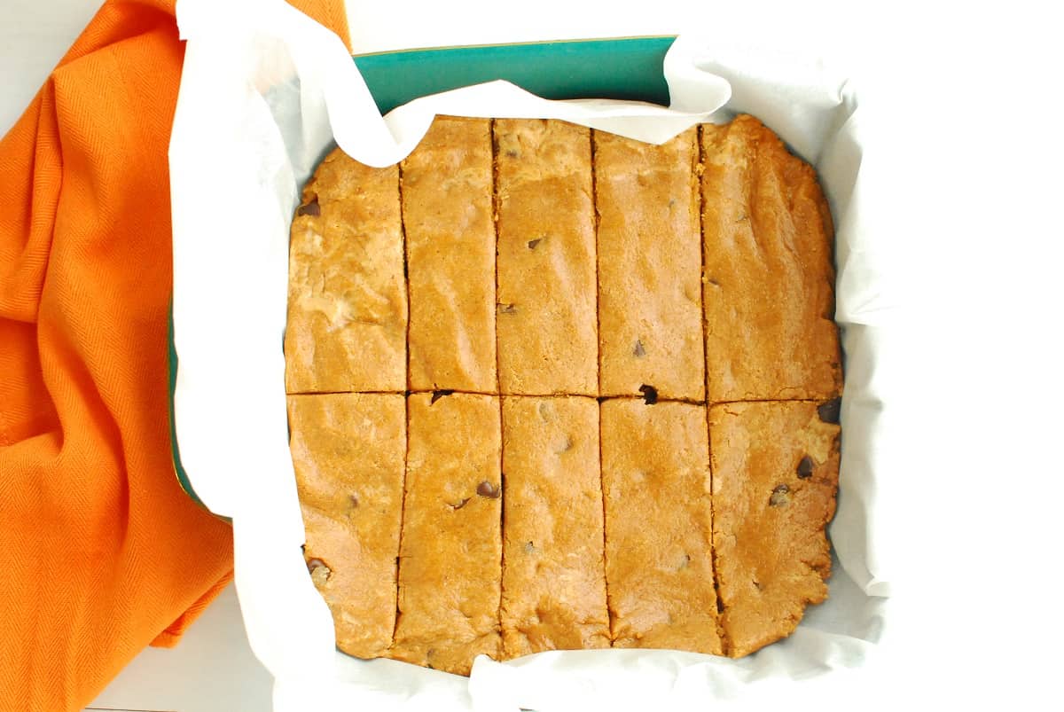 Pumpkin spice protein bars in the baking dish, cut up.