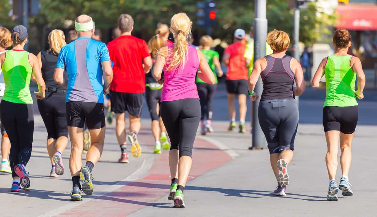 A run club running together in a city.