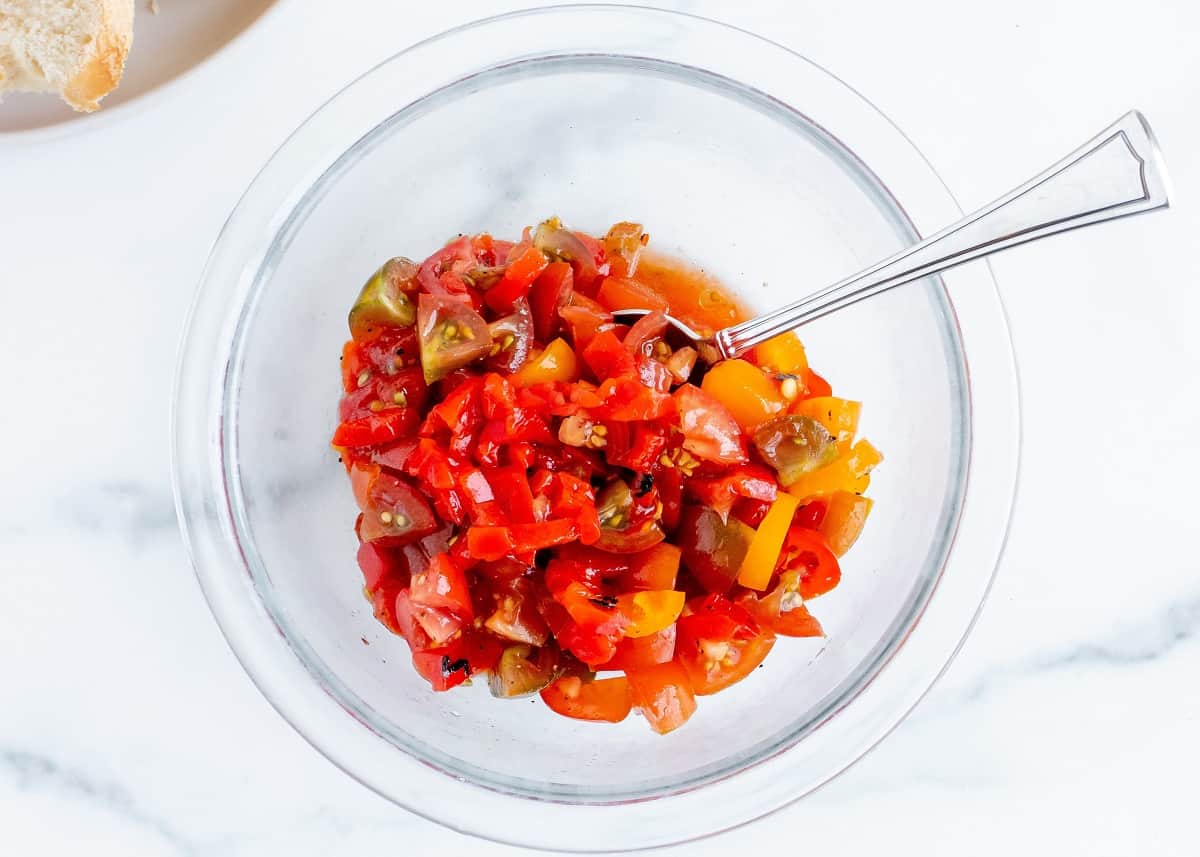 A bowl with the tomato and roasted red pepper mixture.