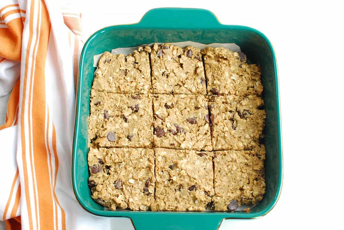 A baking dish with just-baked oatmeal chickpea chocolate chip bars.