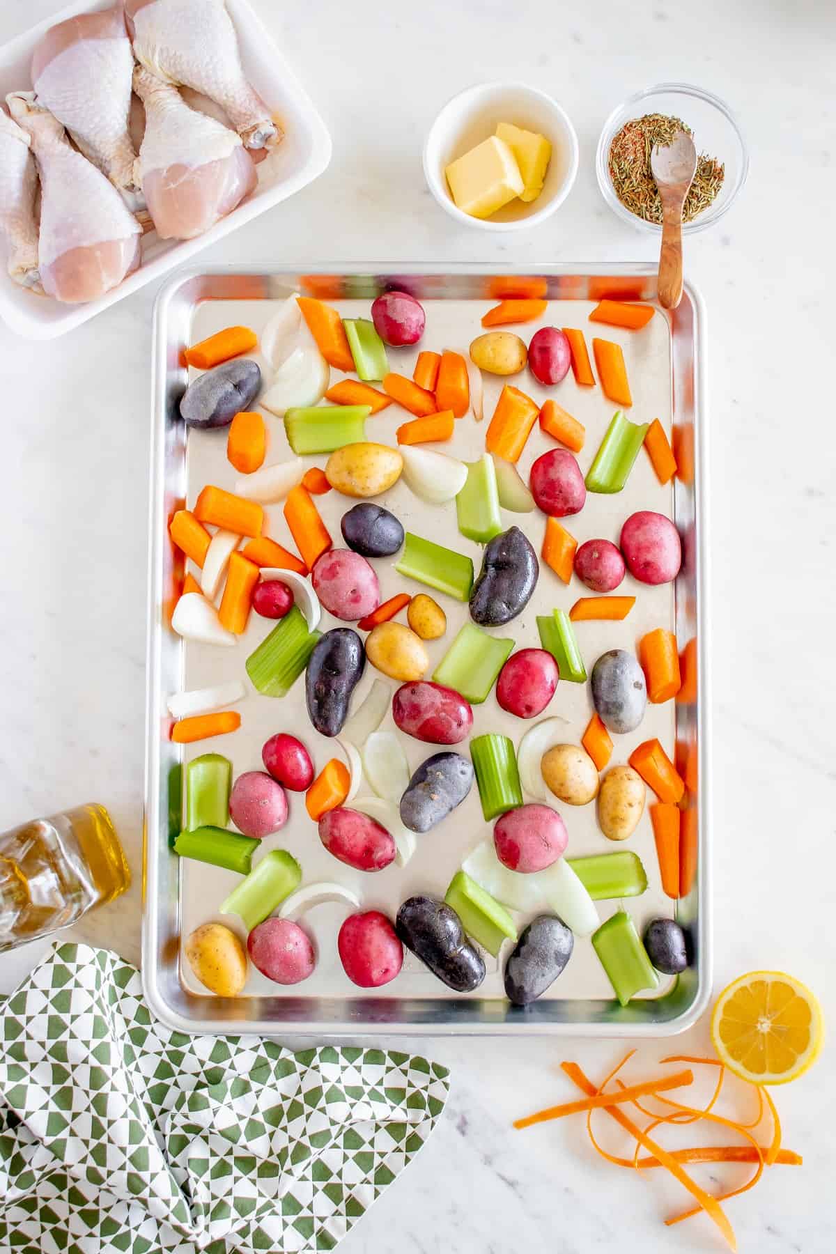 Vegetables chopped and placed on a roasting dish.