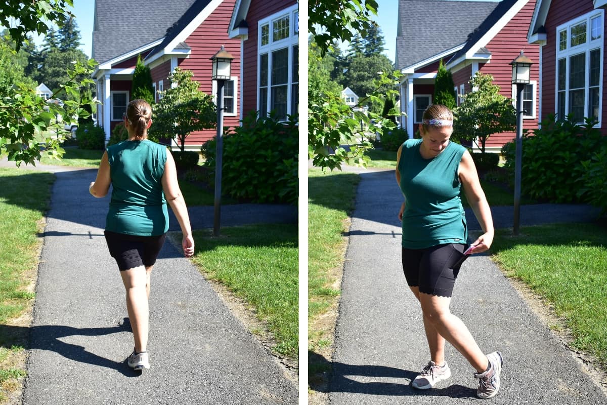 A woman wearing a Shredly tank top and shorts outside.