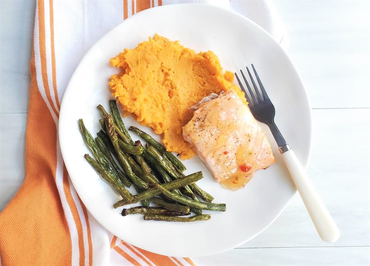 Chili salmon, mashed sweet potatoes, and roasted green beans.