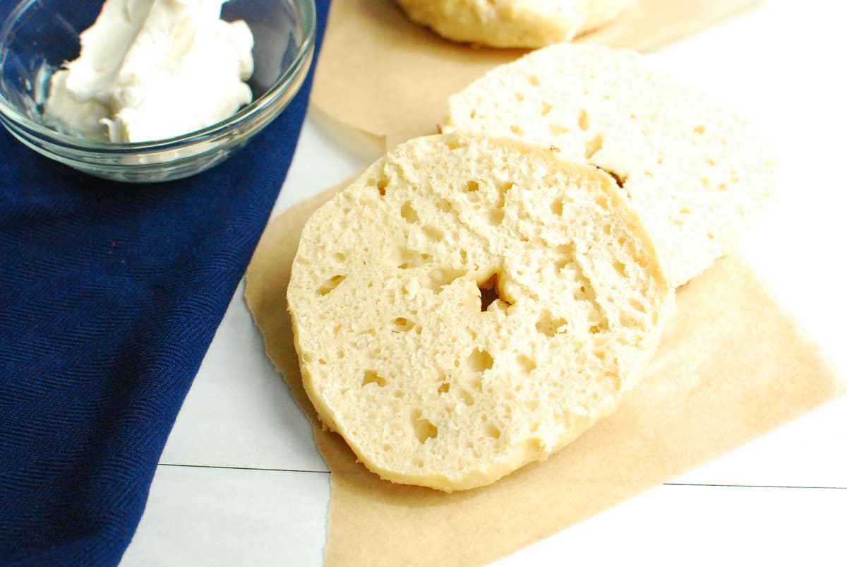 A sliced cottage cheese bagel showing the interior texture.