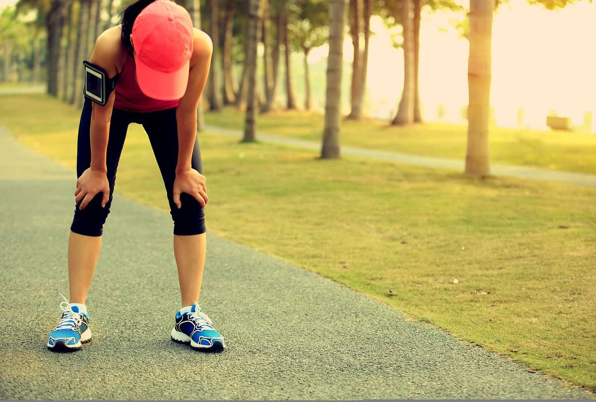 A tired female runner who is doing intermittent fasting.