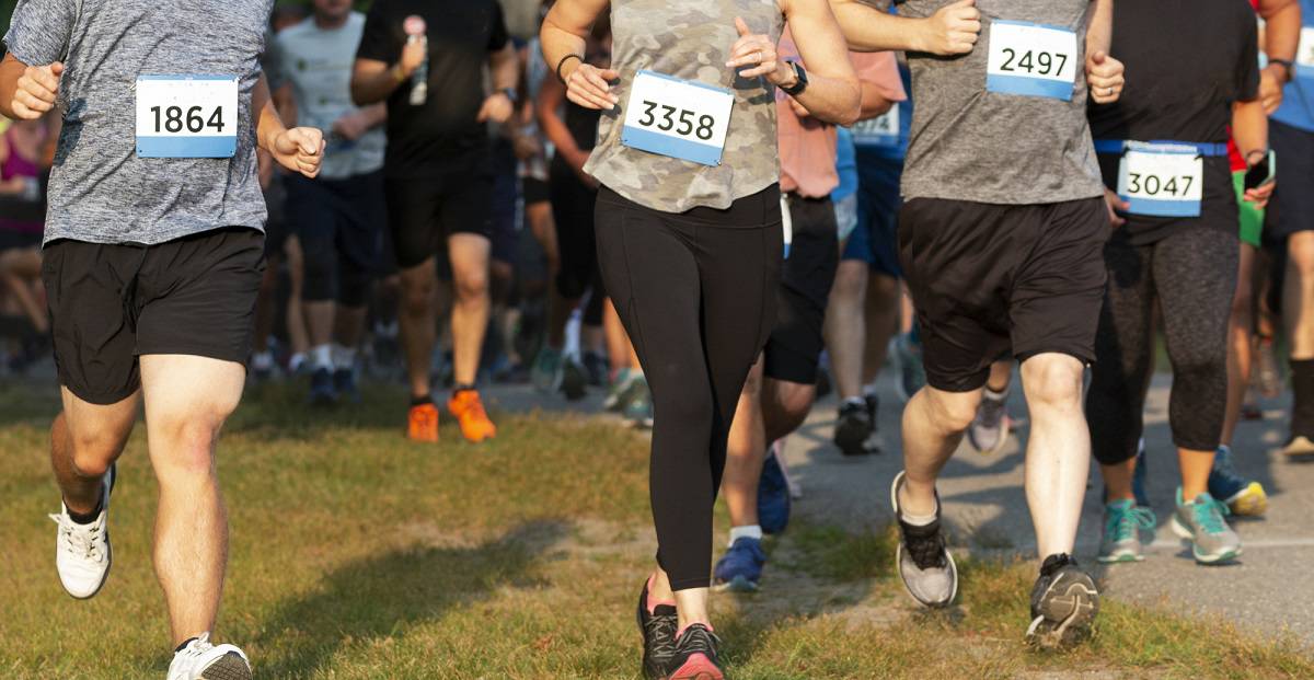 A group of runners in a 5K race.