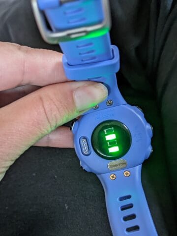 The LED and optical sensor on the bottom of the watch that measure heart rate.