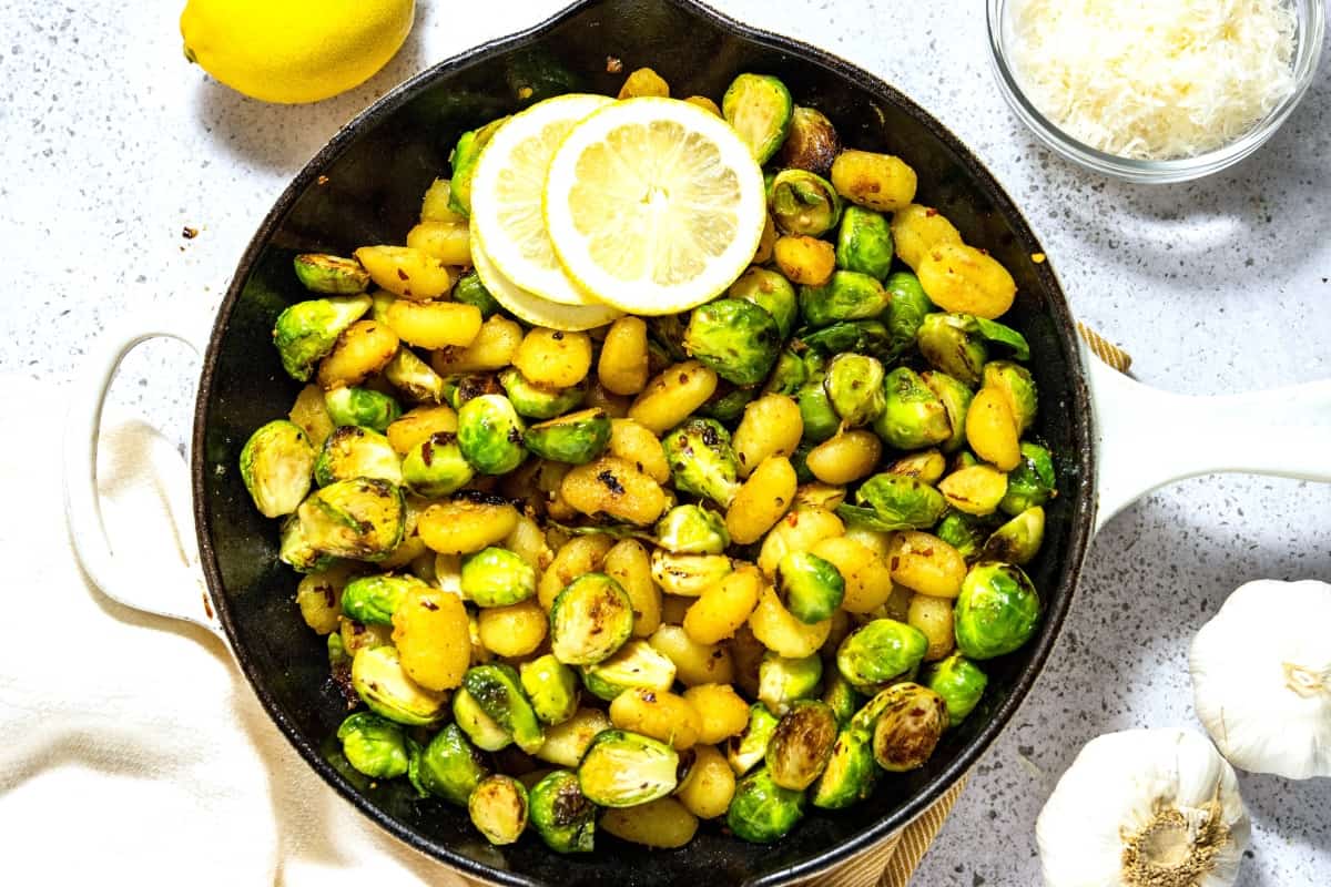 Brussels sprouts stirred into the skillet with the gnocchi mixture.