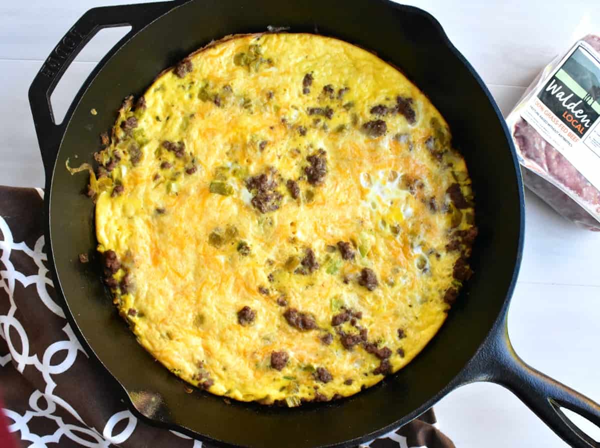 A cheeseburger frittata in a skillet.