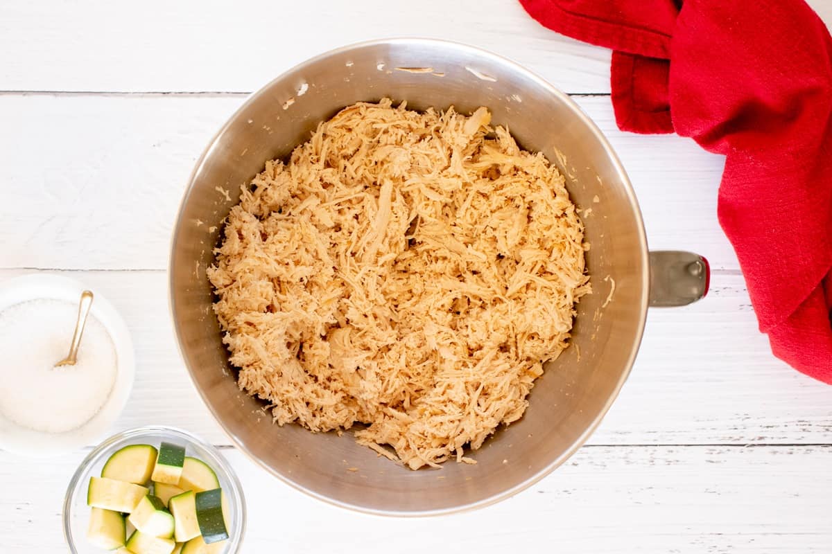 Shredded chicken in a bowl.