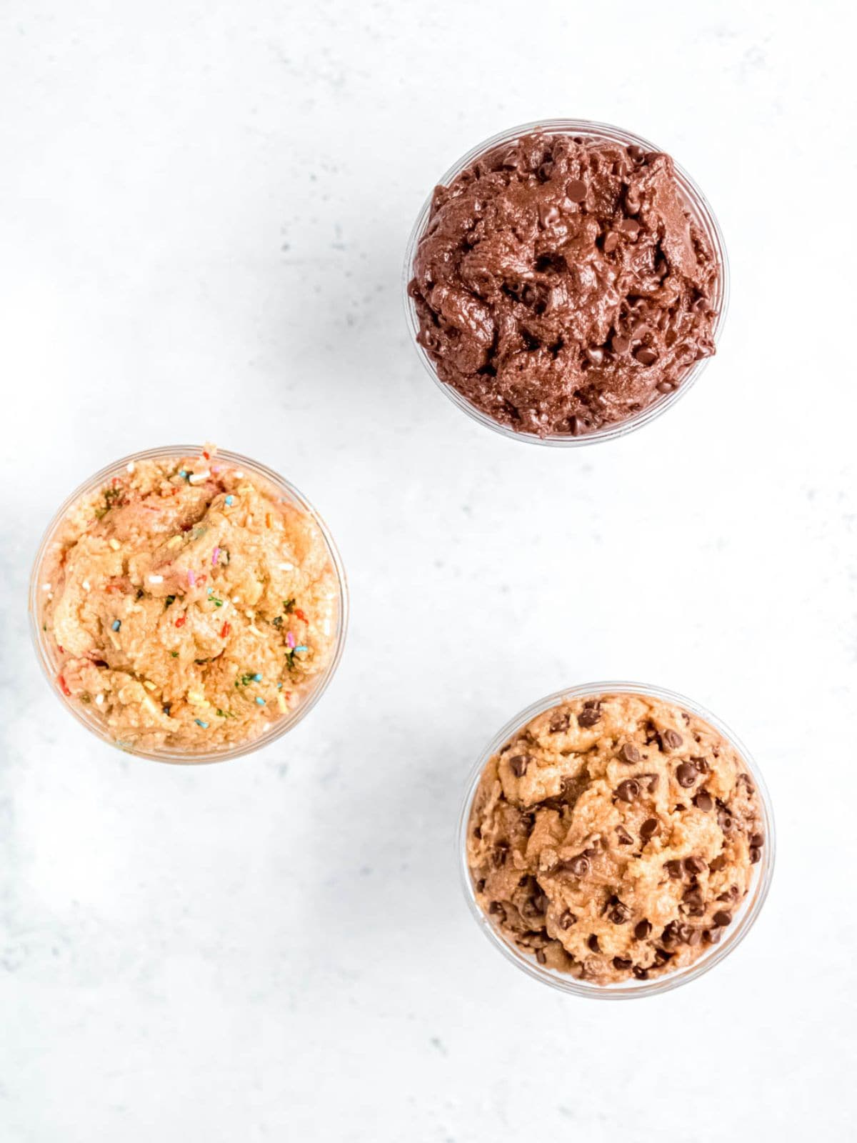 Three different flavors of protein cookie dough.