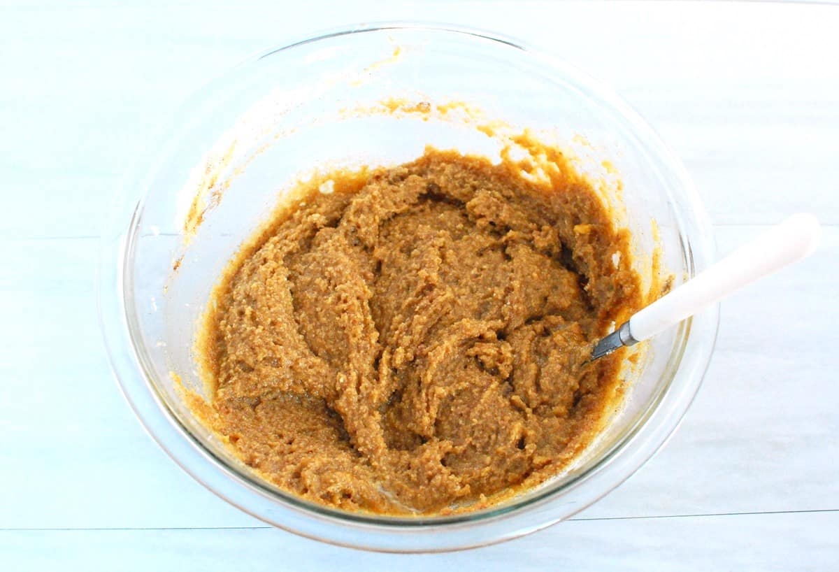 Muffin batter in a glass bowl.