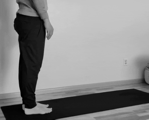 A man doing the inchworm exercise.