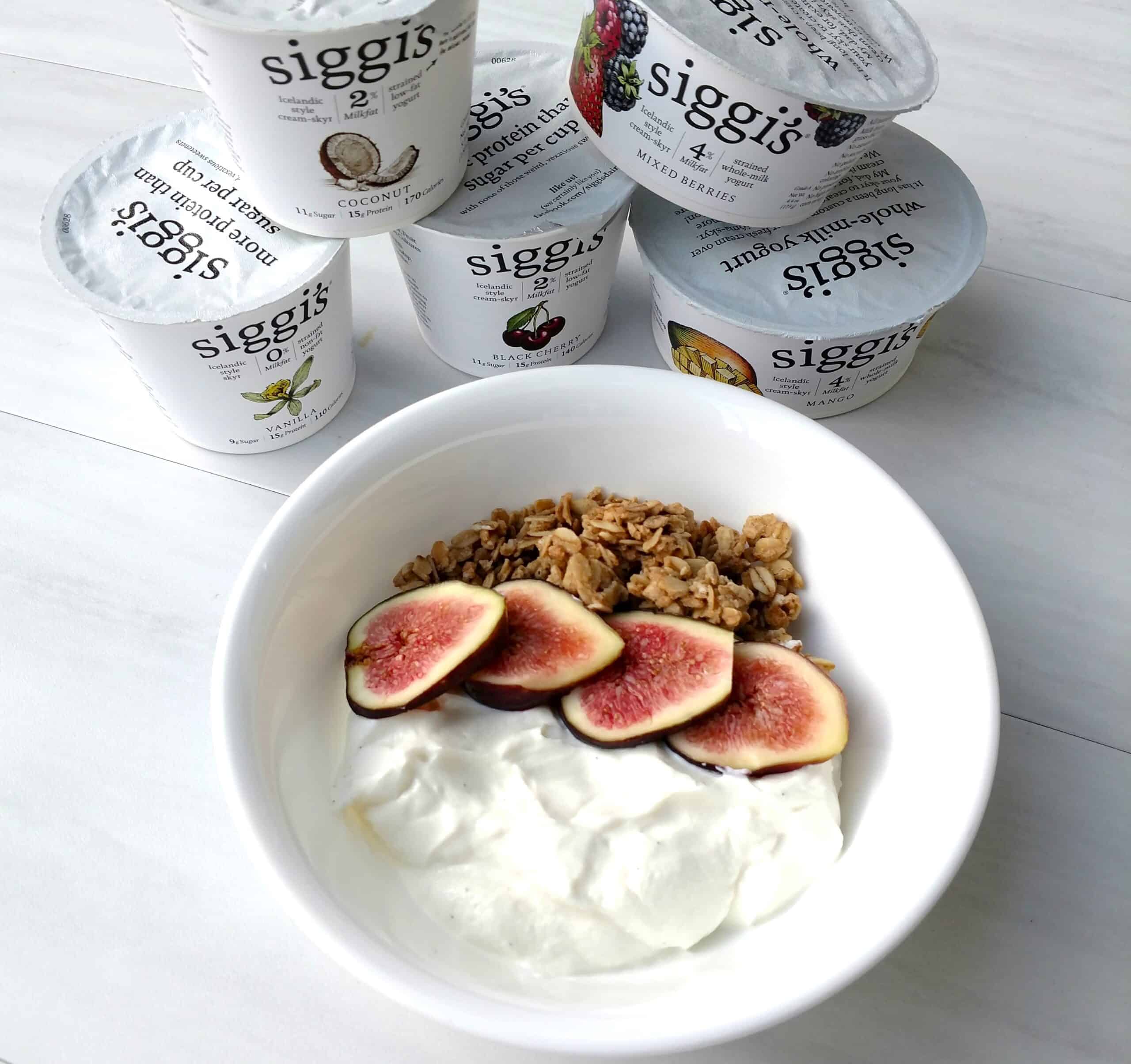 A bowl of Siggi's yogurt topped with figs.