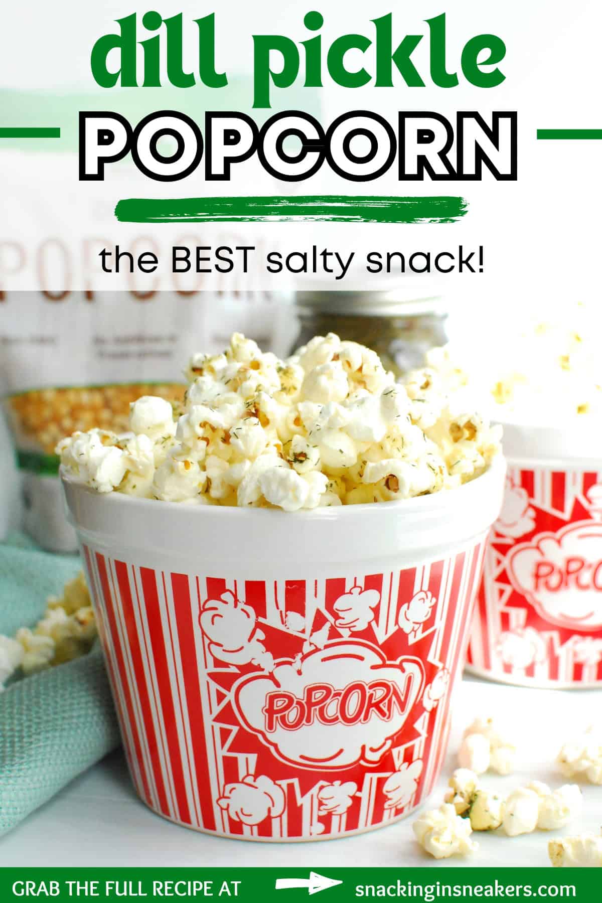 A bowl of dill pickle popcorn with a text overlay with the name of the recipe.