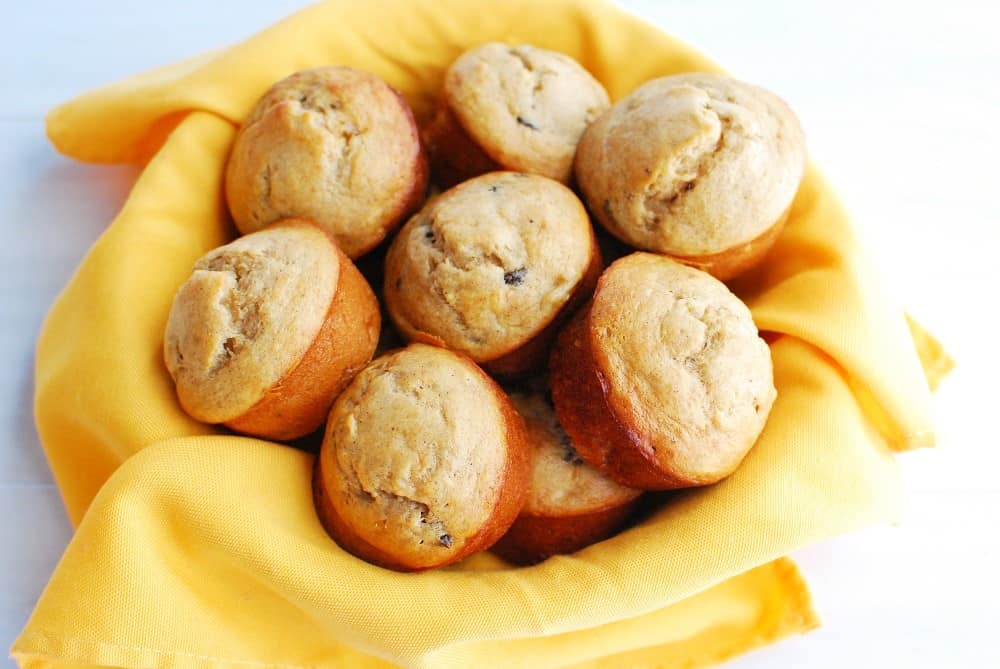 A bowl full of homemade muffins.