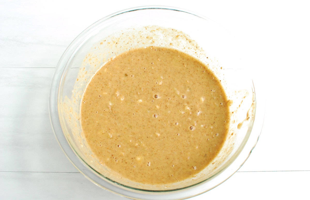 All the liquid ingredients whisked together in a glass mixing bowl.
