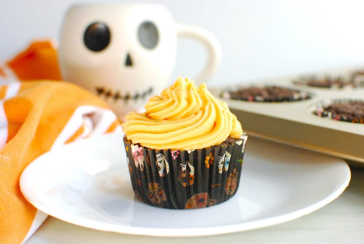 A Halloween themed chocolate sweetpotato cupcake with sweetpotato frosting.