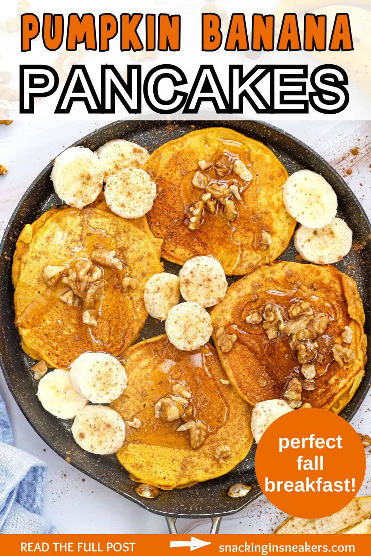 Several pumpkin banana pancakes in a pan, topped with bananas and maple syrup.