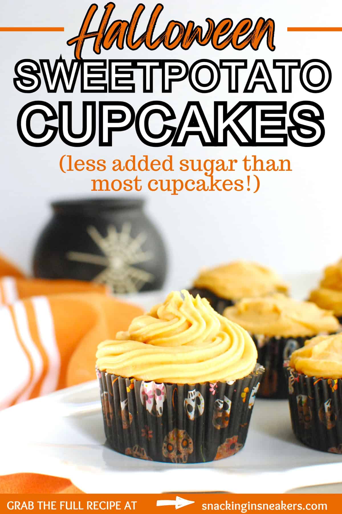 A healthy Halloween cupcake made with sweetpotatoes in both the base and frosting, with a text overlay with the name of the recipe.