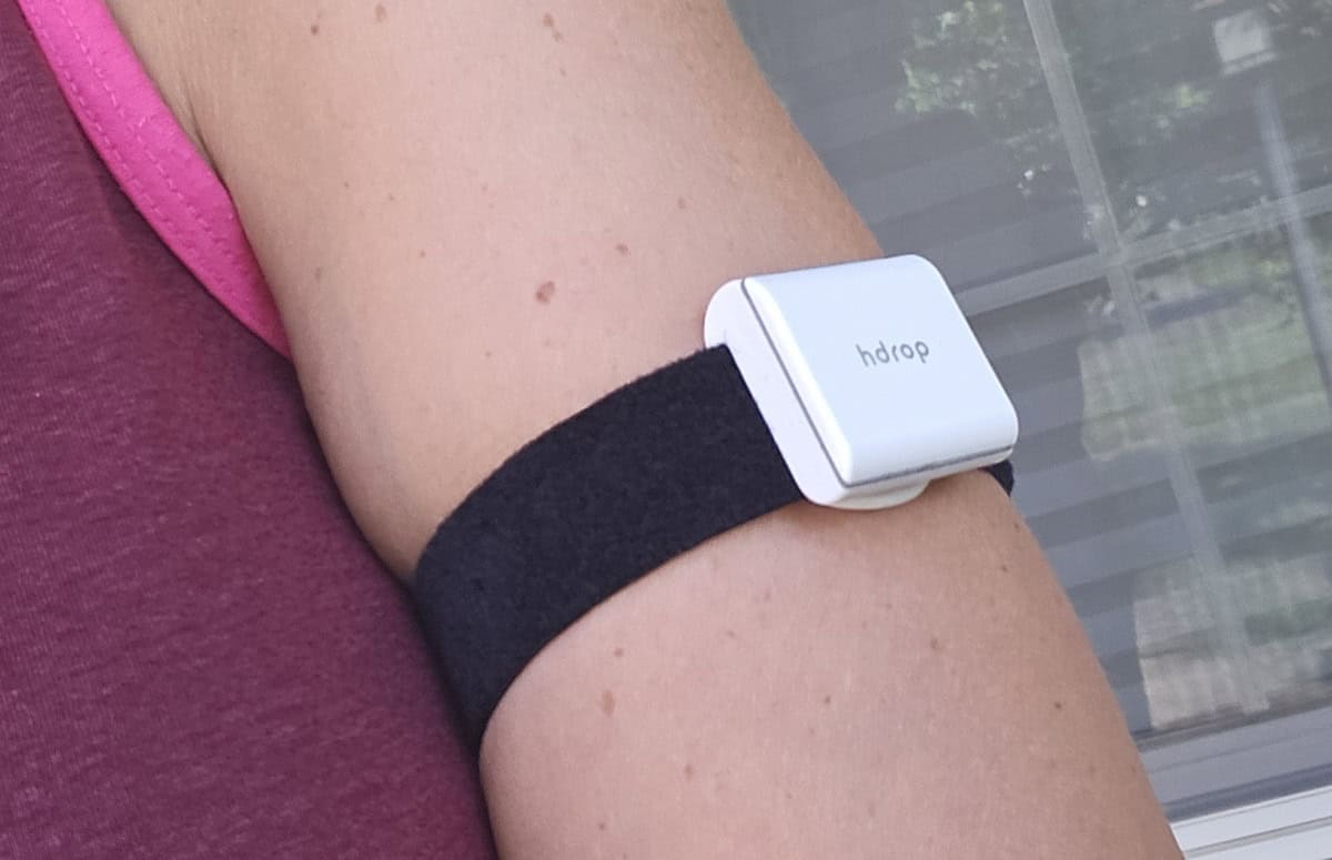 An hdrop hydration sensor on a woman's arm.