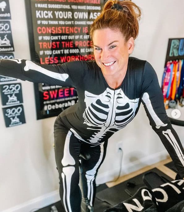 A woman dressed as a skeleton for a Halloween costume.