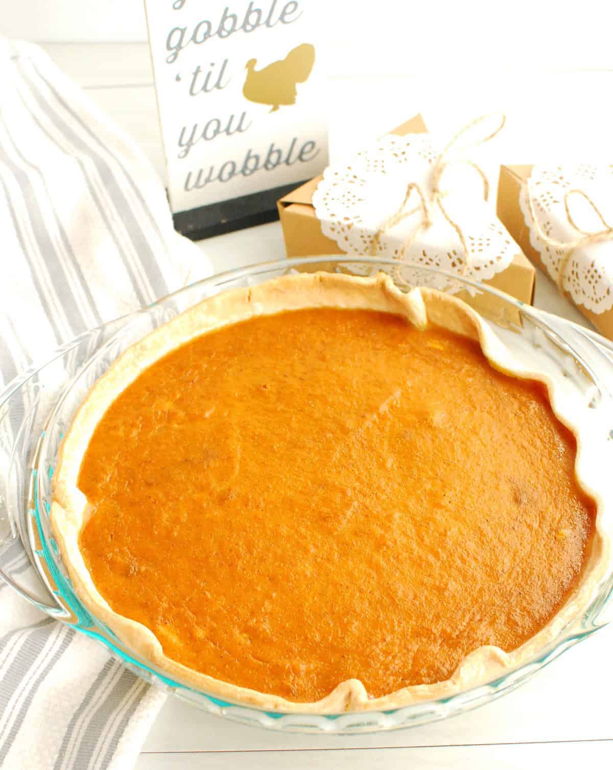 A matcha pumpkin pie in the pie plate.