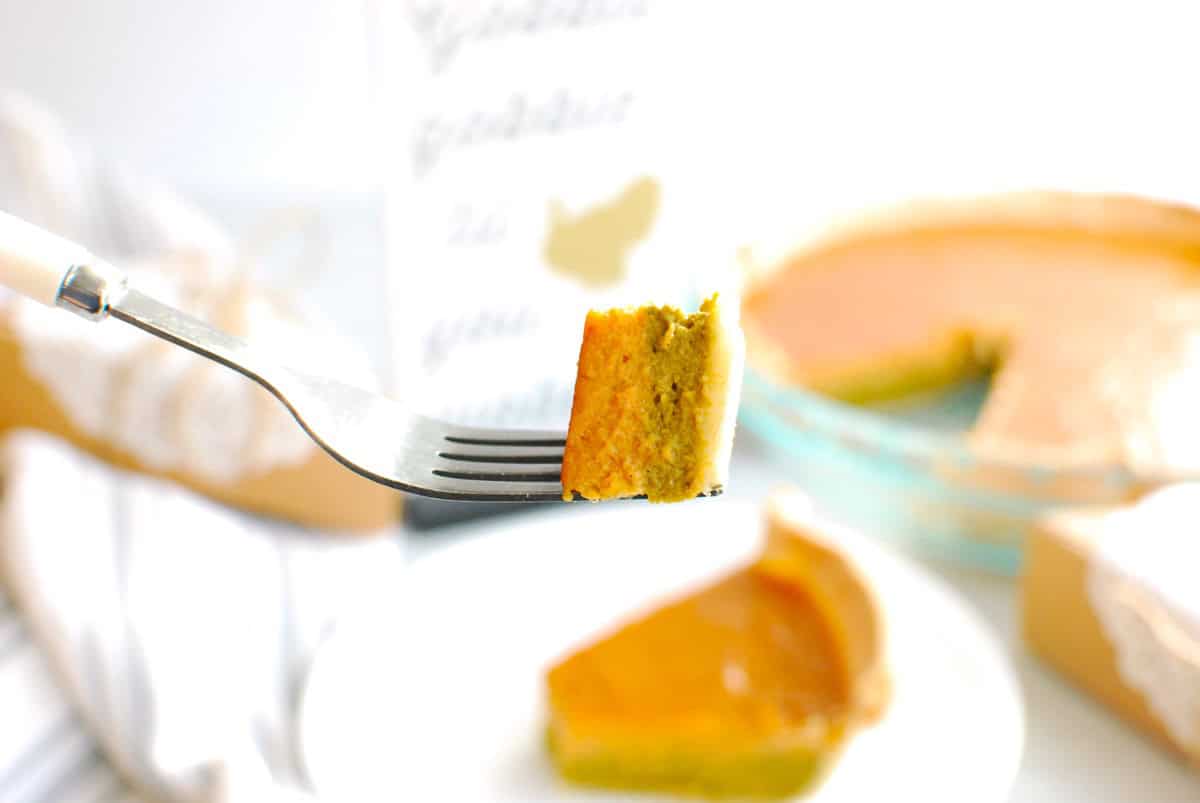 A fork full of matcha pumpkin pie.