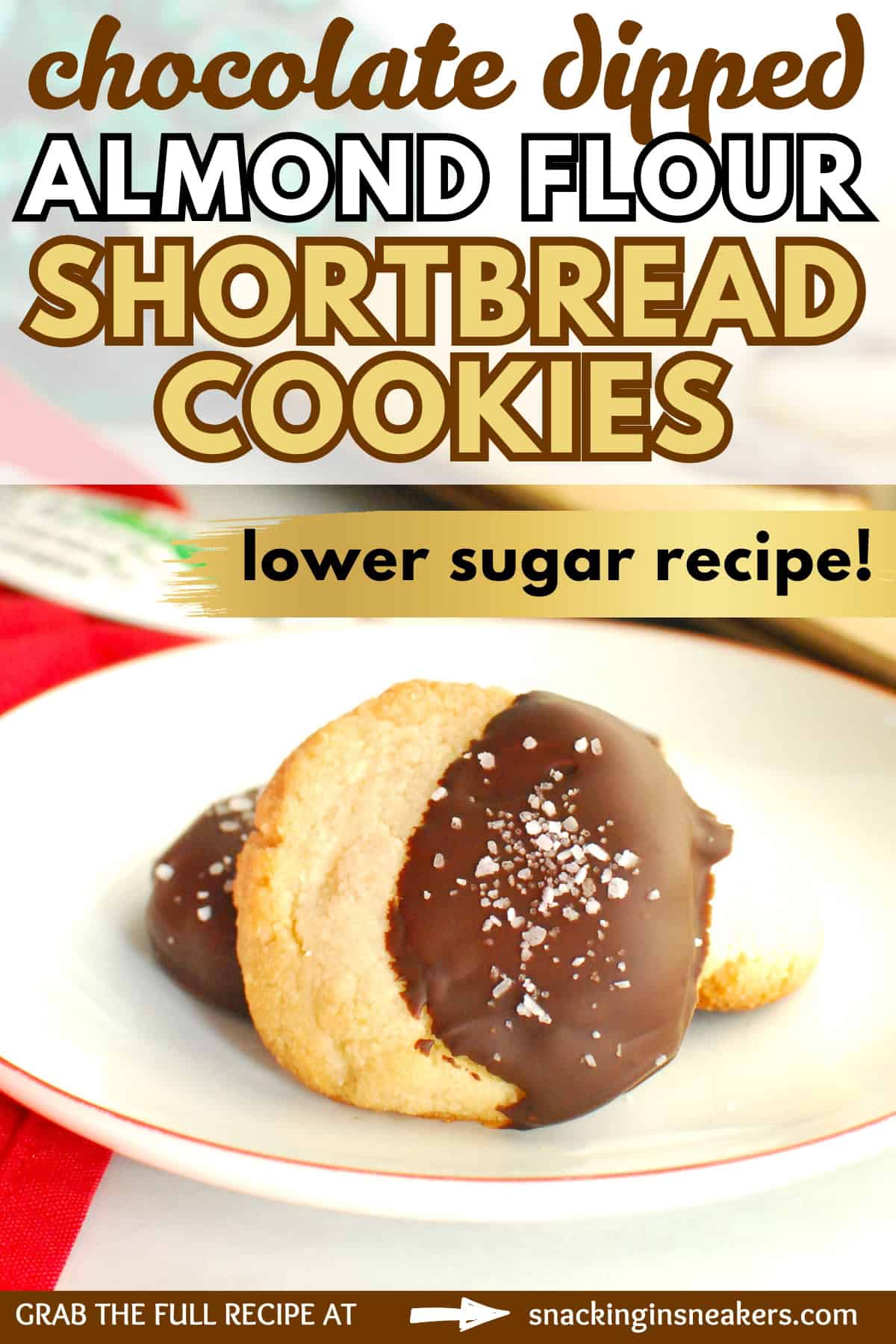 A plate with a couple almond flour shortbread cookies that were dipped in chocolate and sprinkled with salt, with a text overlay with the name of the recipe.