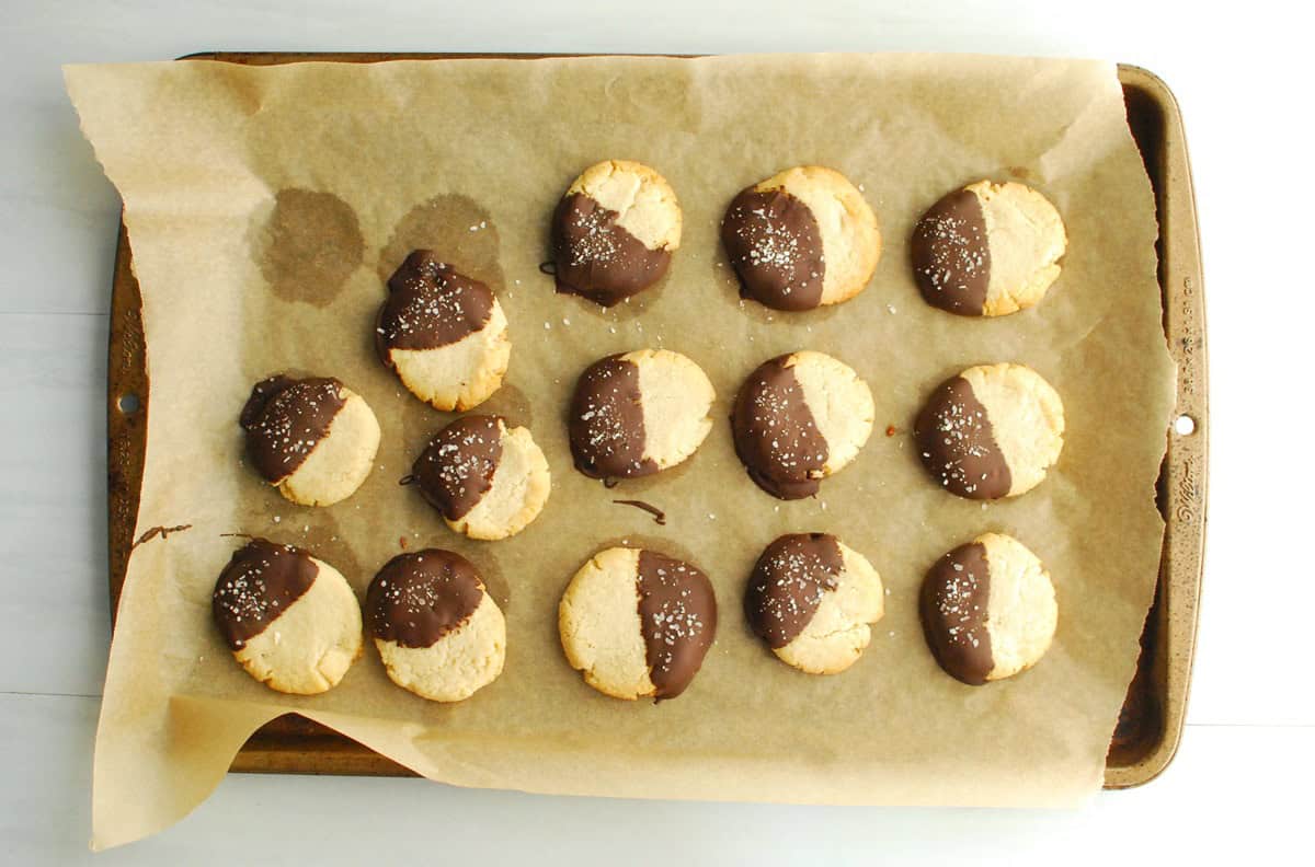 Cookies dipped in chocolate and sprinkled with coarse salt.