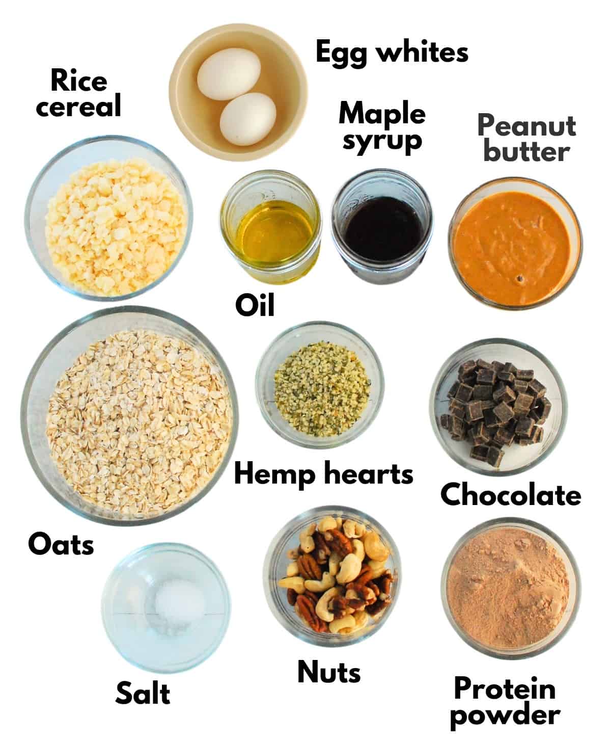 Oats, rice cereal, protein powder, nuts, hemp hearts, salt, peanut butter, olive oil, maple syrup, eggs, and chocolate.
