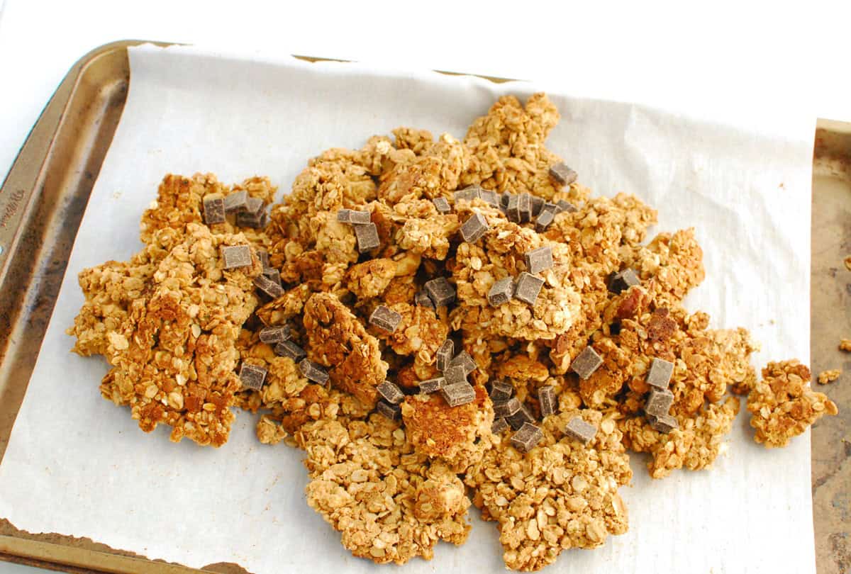 Chocolate chunks mixed into the pan of granola.