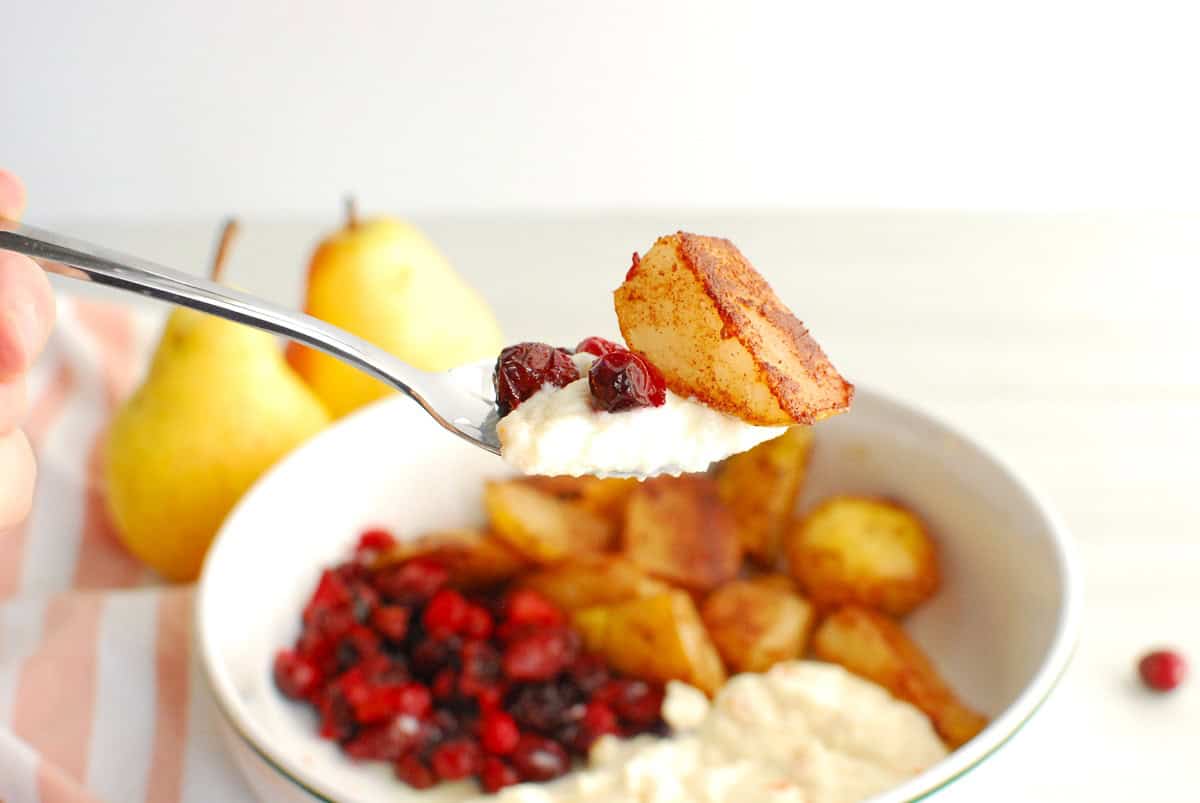 A spoonful of ricotta, cranberries, and pear.