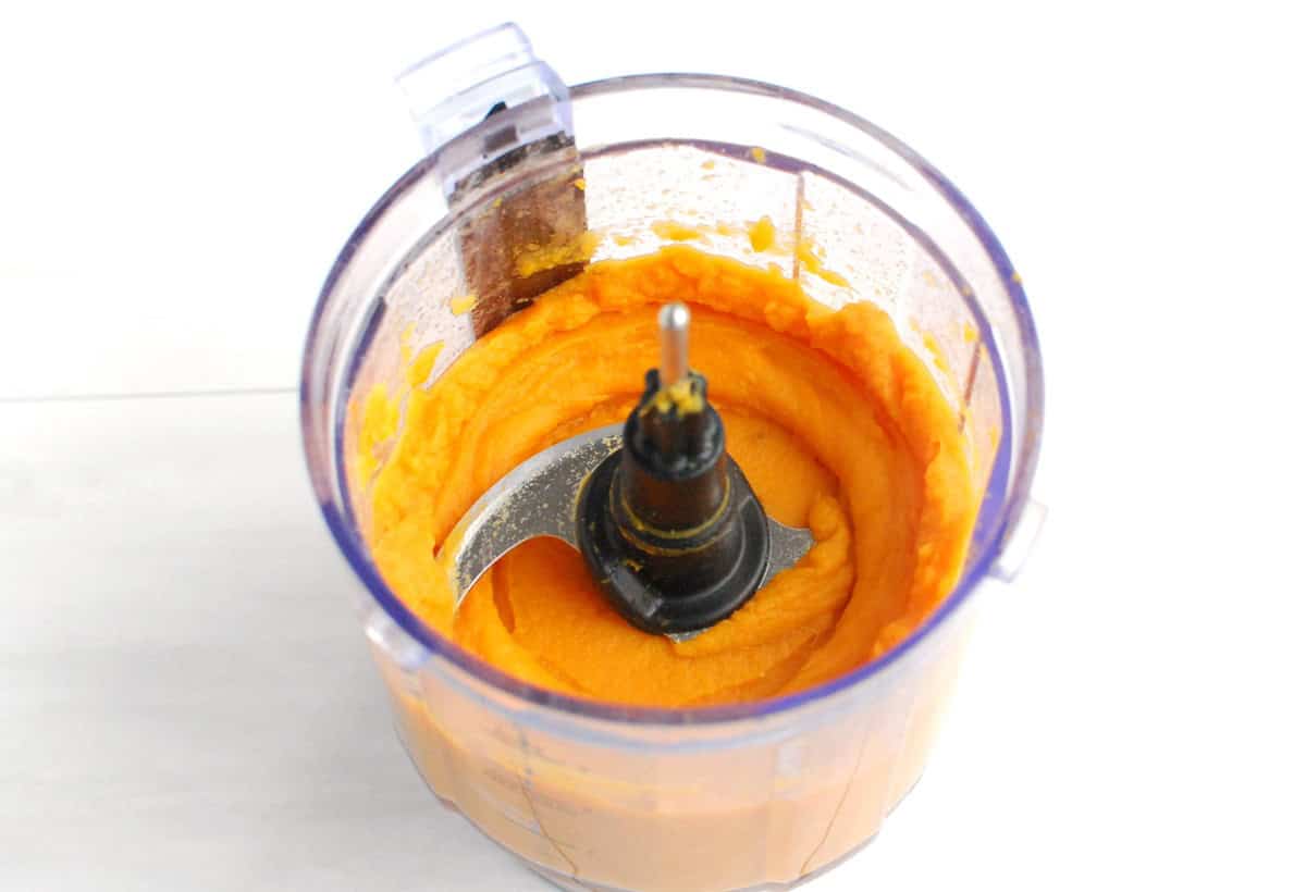 Cooked sweetpotato pureed in a mini food processor.