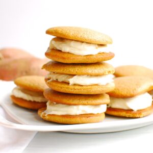 Three sweetpotato protein whoopie pies stacked on top of each other.