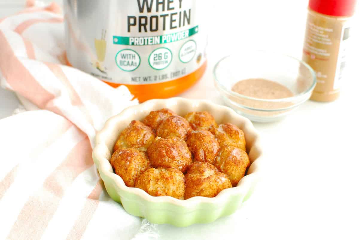 A ramekin filled with high protein single serve monkey bread.