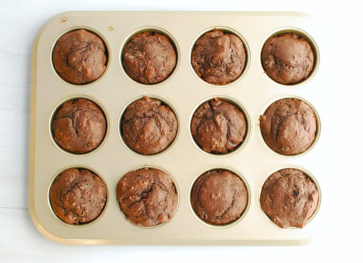 Just baked muffins still in the muffin tin.