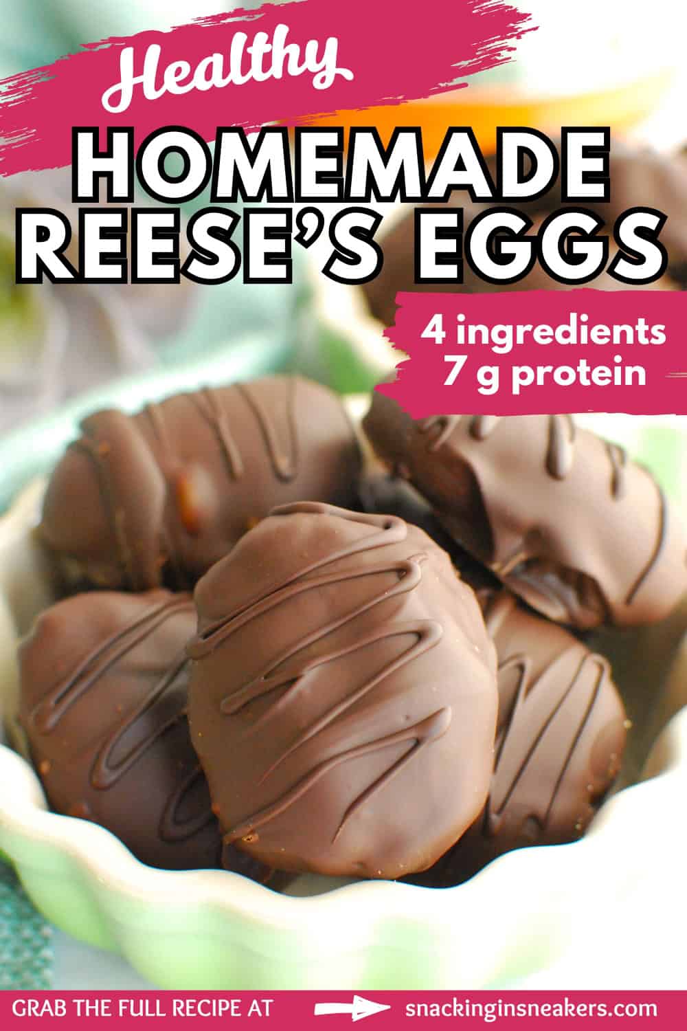 A bowl filled with healthy chocolate peanut butter eggs with a text overlay with the name of the recipe.