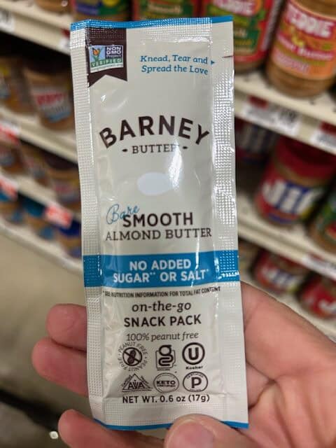 A single serving pack of almond butter.