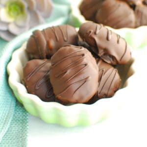 A small ramekin filled with healthy homemade peanut butter eggs.