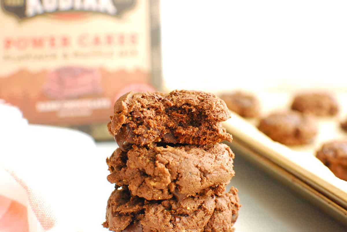 A cookie with a bite taken out of it.