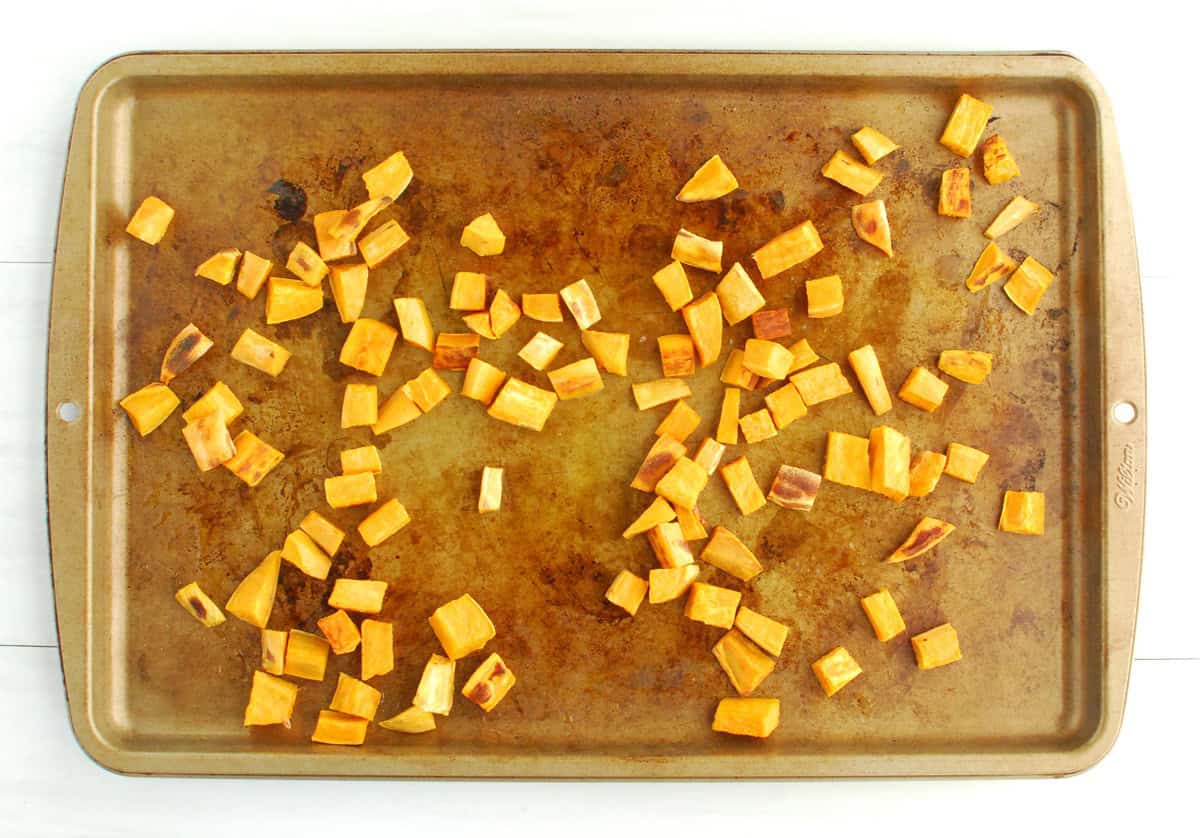 Roasted sweetpotatoes on a baking sheet.