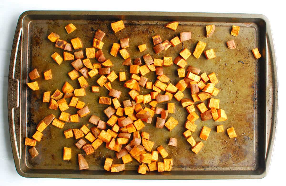 Roasted sweetpotatoes on a baking sheet.