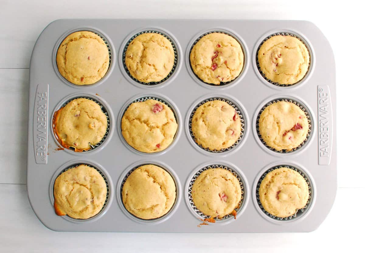 Just baked Kodiak raspberry muffins in a muffin tin.