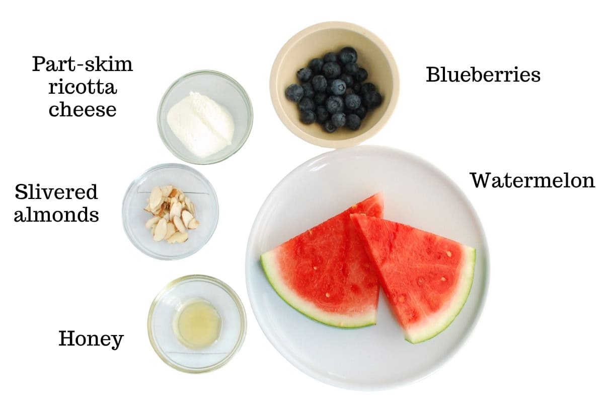 Watermelon, blueberries, ricotta, almonds, and honey.
